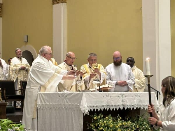 Deacon Martin and Deacon Ken Fahlman assisting with the Eucharist celebration at their ordination on June 14, 2024